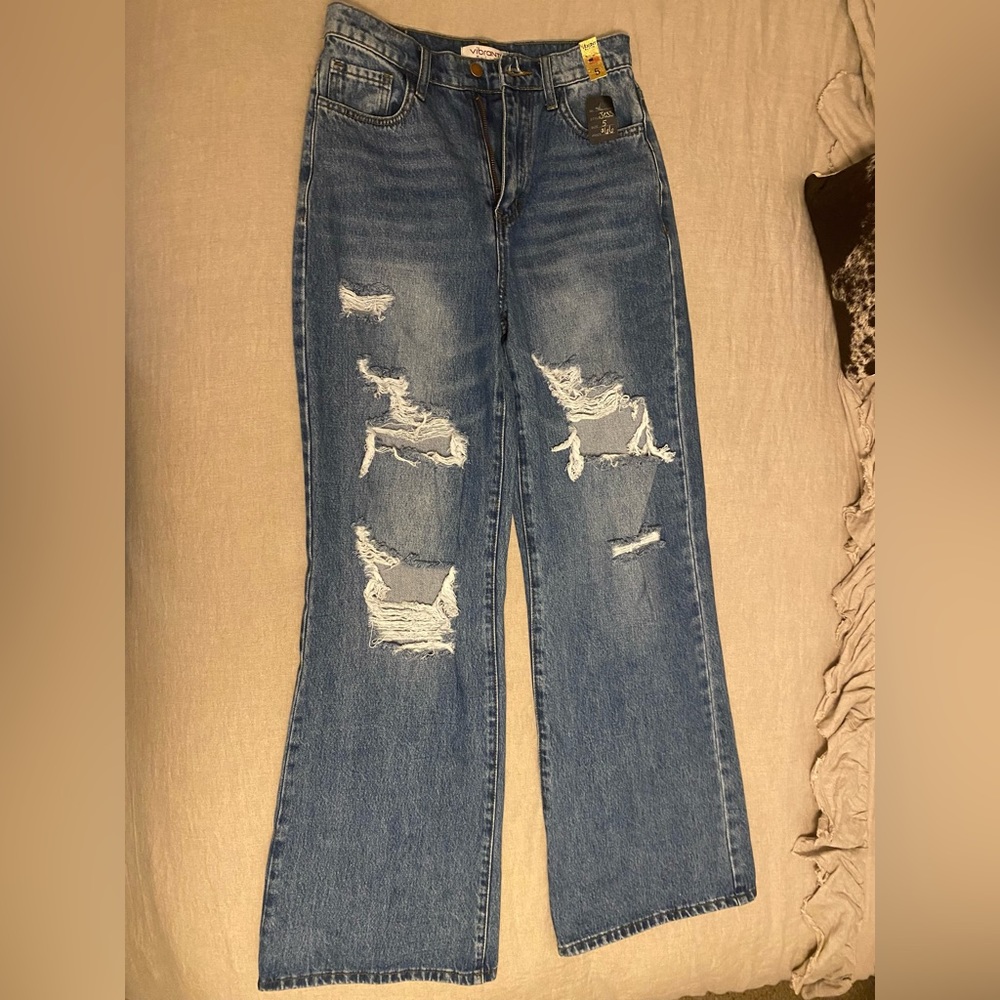 Vibrant wide leg high waisted distressed jeans